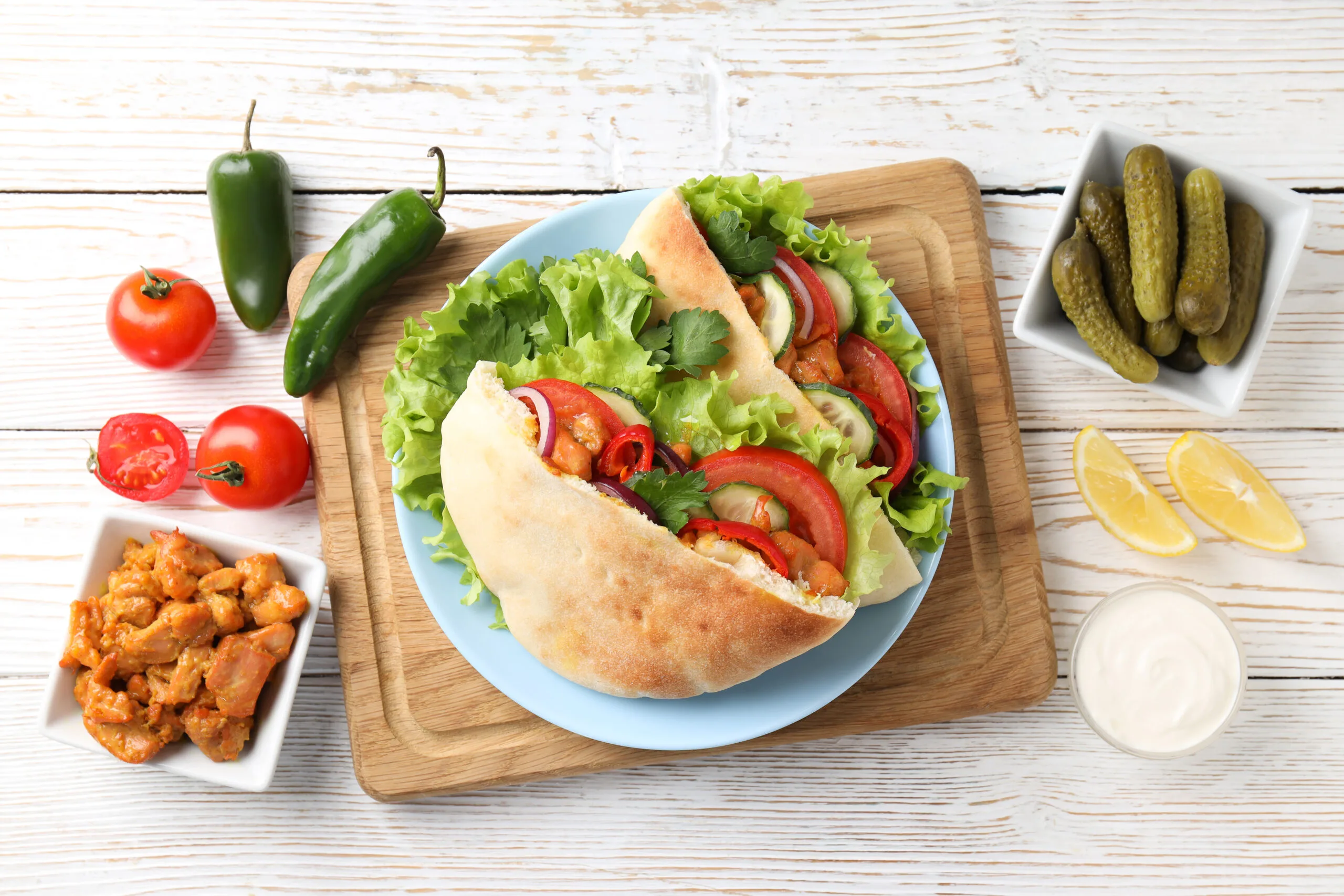 concept of tasty food with pita with chicken top 2025 03 24 11 19 21 utc 1 scaled
