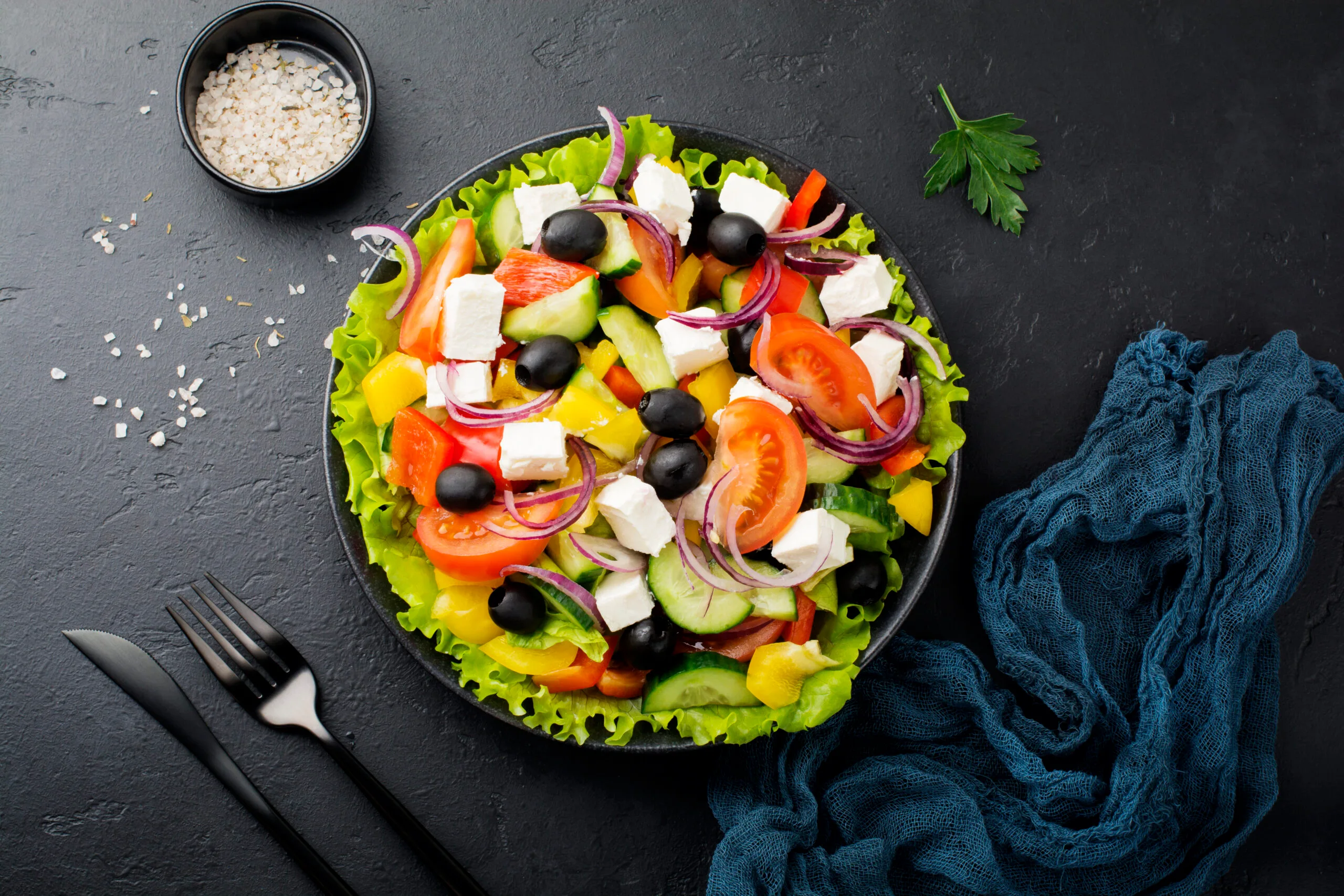 greek salad in ceramic plate on black concrete bac 2025 03 26 00 42 12 utc scaled