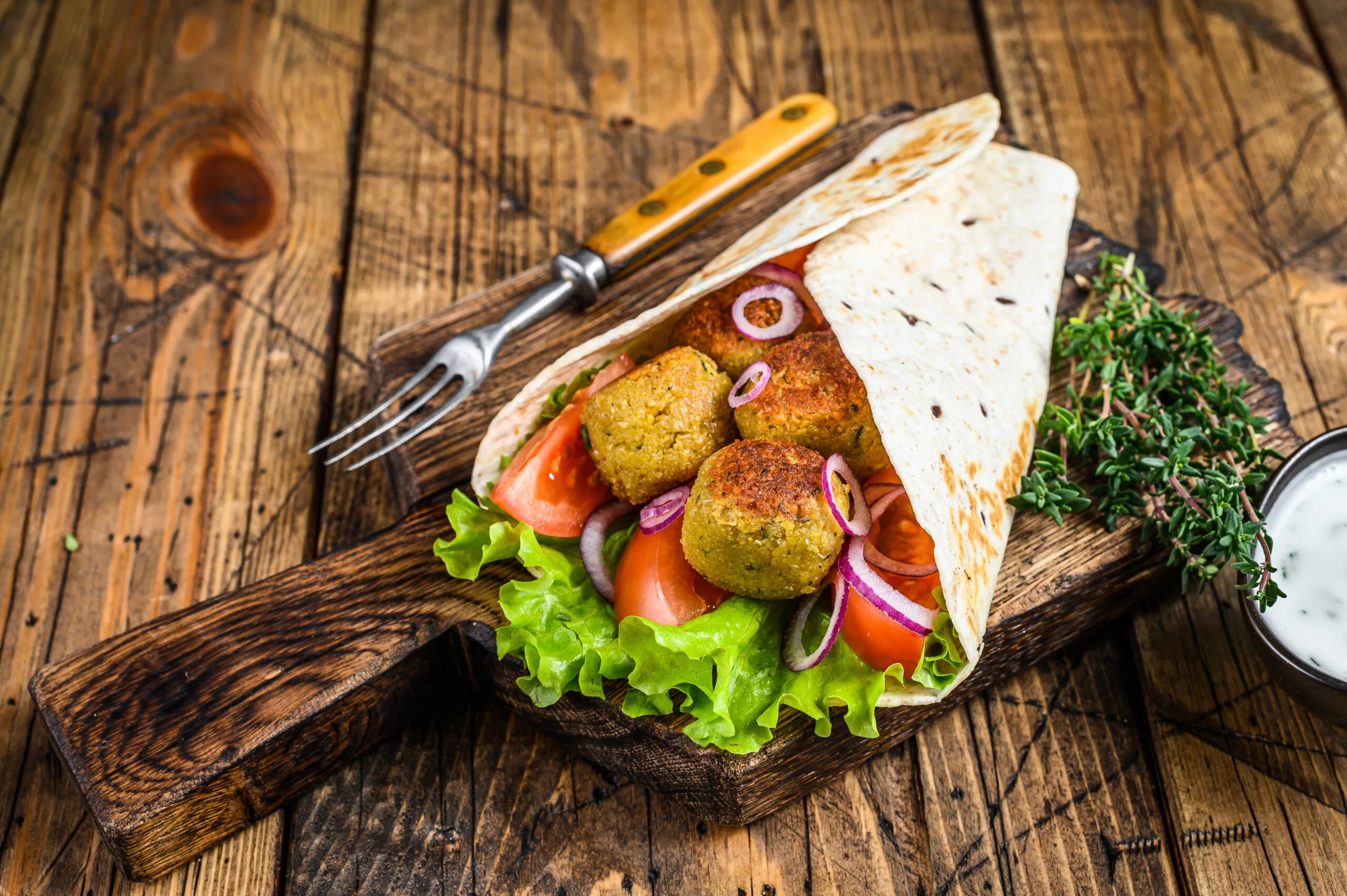 vegetarian tortilla wrap with falafel and fresh sa 2024 12 09 03 05 35 utc scaled